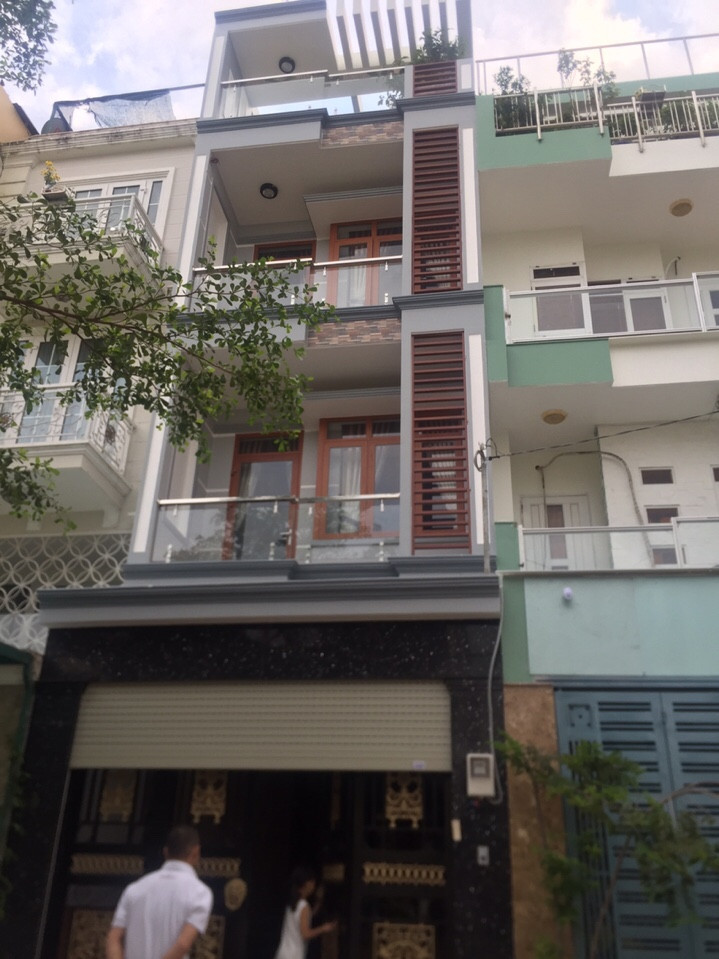 Bán nhà mặt tiền Phú Thuận - Quận 7, DT 4x20m 1 trệt 2 lầu sân thượng, nhà đẹp KD được. Giá 7.8 tỷ