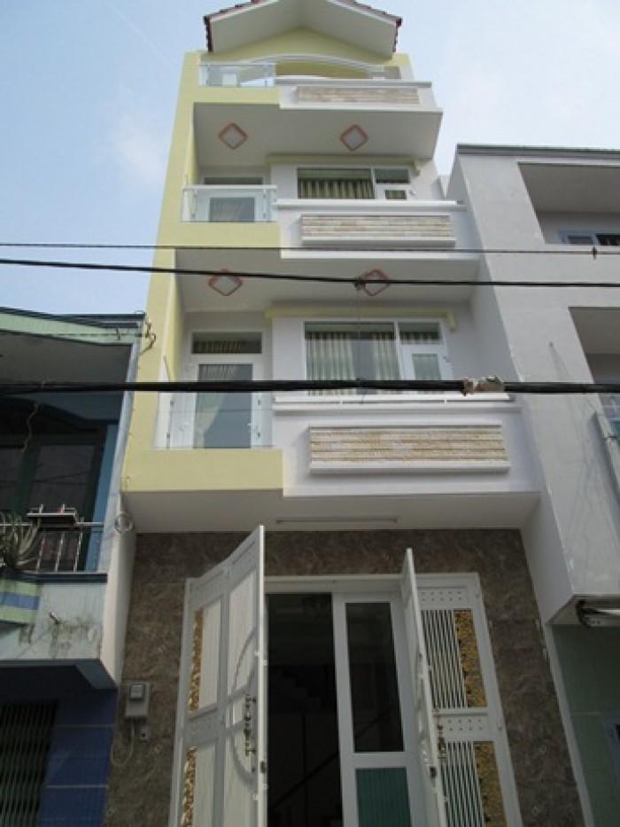 Bán nhà mới hoàn thiện, thiết kế đẹp 2 lầu + sân thượng cách chợ Bình Triệu 200m