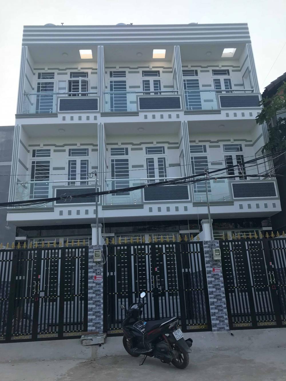 Nhà mới 3 tầng sân thượng, 3.4x11m, sổ hồng, Lê Văn Lương cầu Ông Bốn