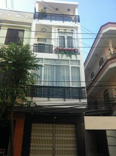 Bán nhà mặt tiền Trần Phú, P. 4, Q. 5, DT: 4 x 10m, nở hậu 5.8m, cấp 4 tiện xây mới
