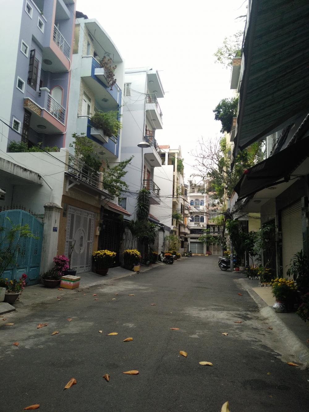 Cần bán gấp nhà đường Phổ Quang, quận Tân Bình, DT 4 x 23m, 1 lầu, gần SVĐ Quân Khu 7, giá 9,2 tỷ
