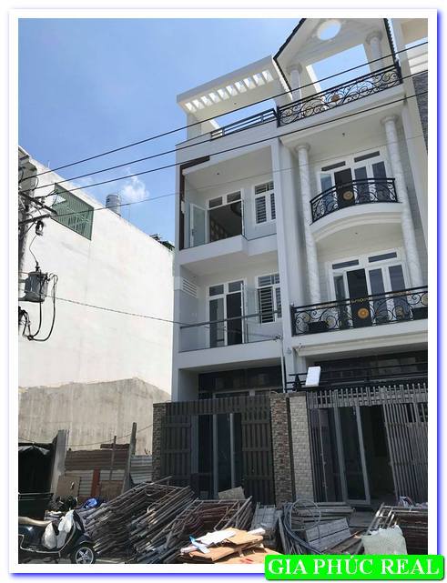 Bán nhà mới MT Lê Quốc Trinh 3.95x18m, đúc 3 lầu, giá 8.4 tỷ