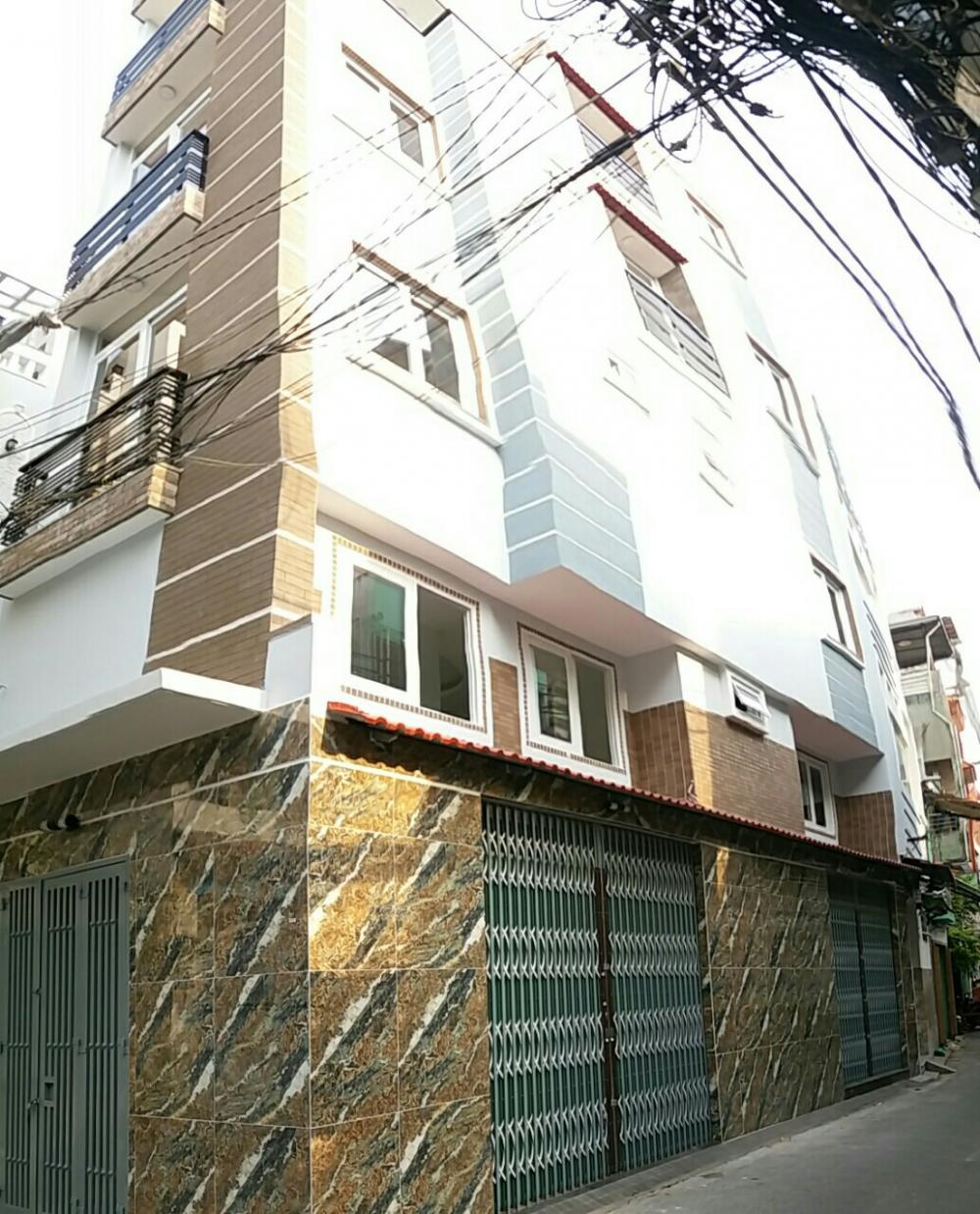Bán gấp căn nhà đường Đặng Văn Ngữ, DT: 5.3x15.8m, trệt, lầu, 13 tỷ