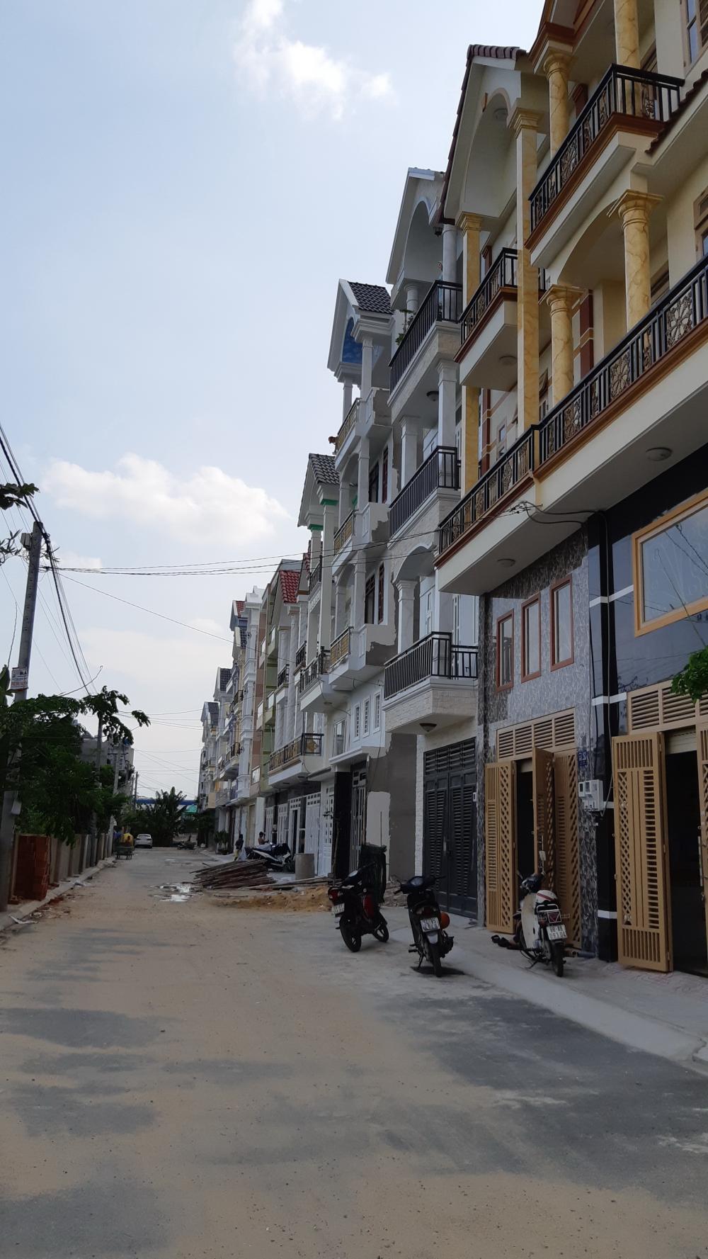 Nhà mới xây, đường nhựa rộng 9m, gần Lê Văn Khương, Hiệp Thành, (5x13m), đúc 4 tấm, 4 tầng, 5 phòng