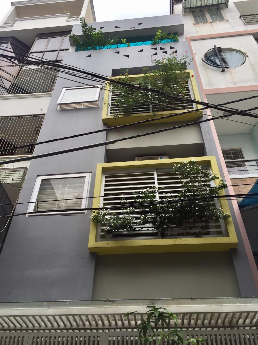 Bán nhà hẻm 8m đường Nguyễn Quang Bích,P13, Tân Bình – DT: 4x21m, nhà 2 lầu đẹp