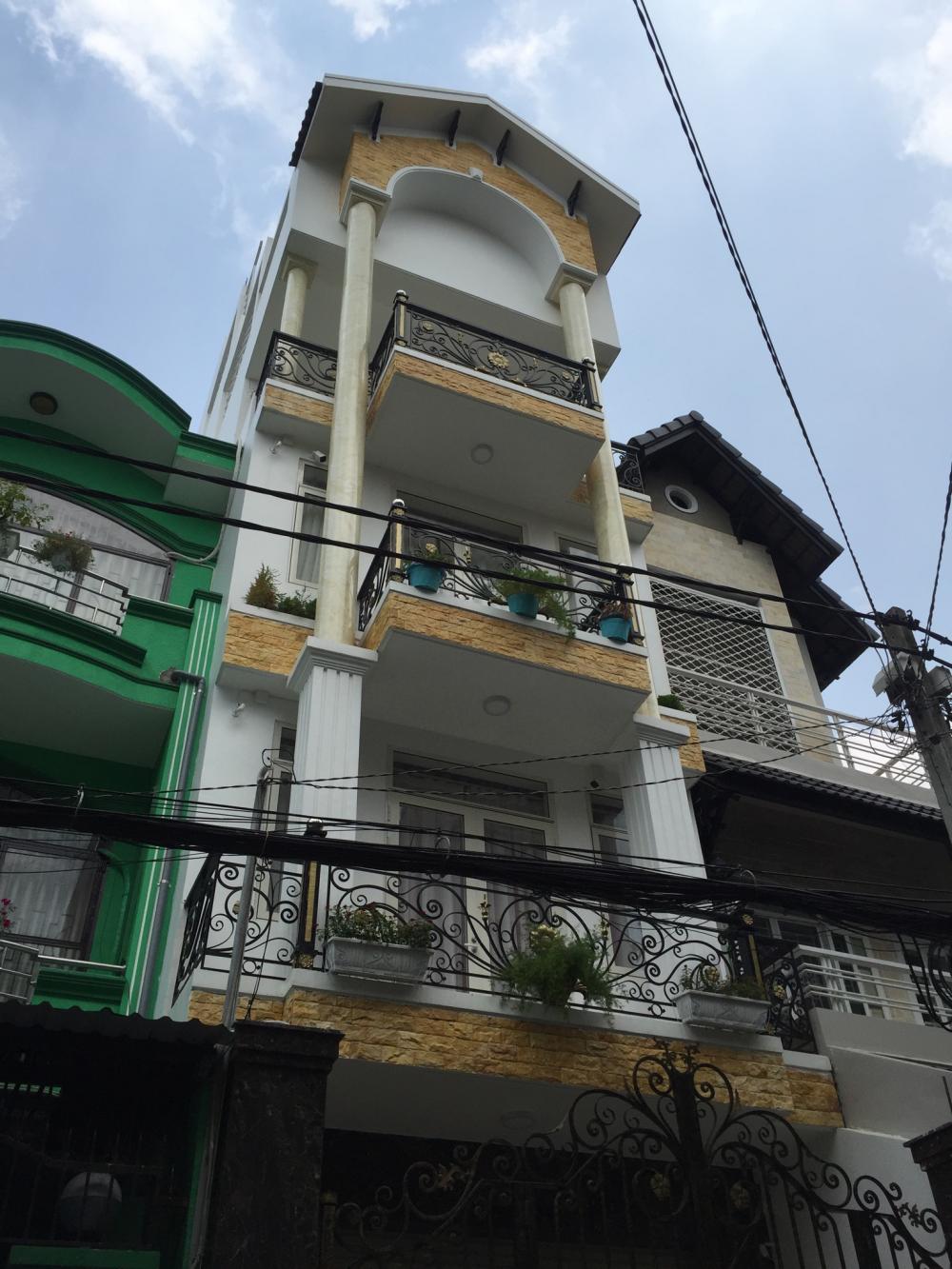 Kẹt tiền bán nhà đường Nguyễn Bặc, P3, DT 4.5 x 15mét, 4 lầu