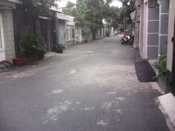 Bán nhà MT Sơn Cang - Châu Vĩnh Tế, P12. 5,2x18m, trệt 1 lầu kiên cố