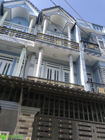 1)	Nhà 1 trệt 2 lầu  đường Nguyễn anh Thủ đường  xe con đi vào rỗng rãi giá 1.590tr