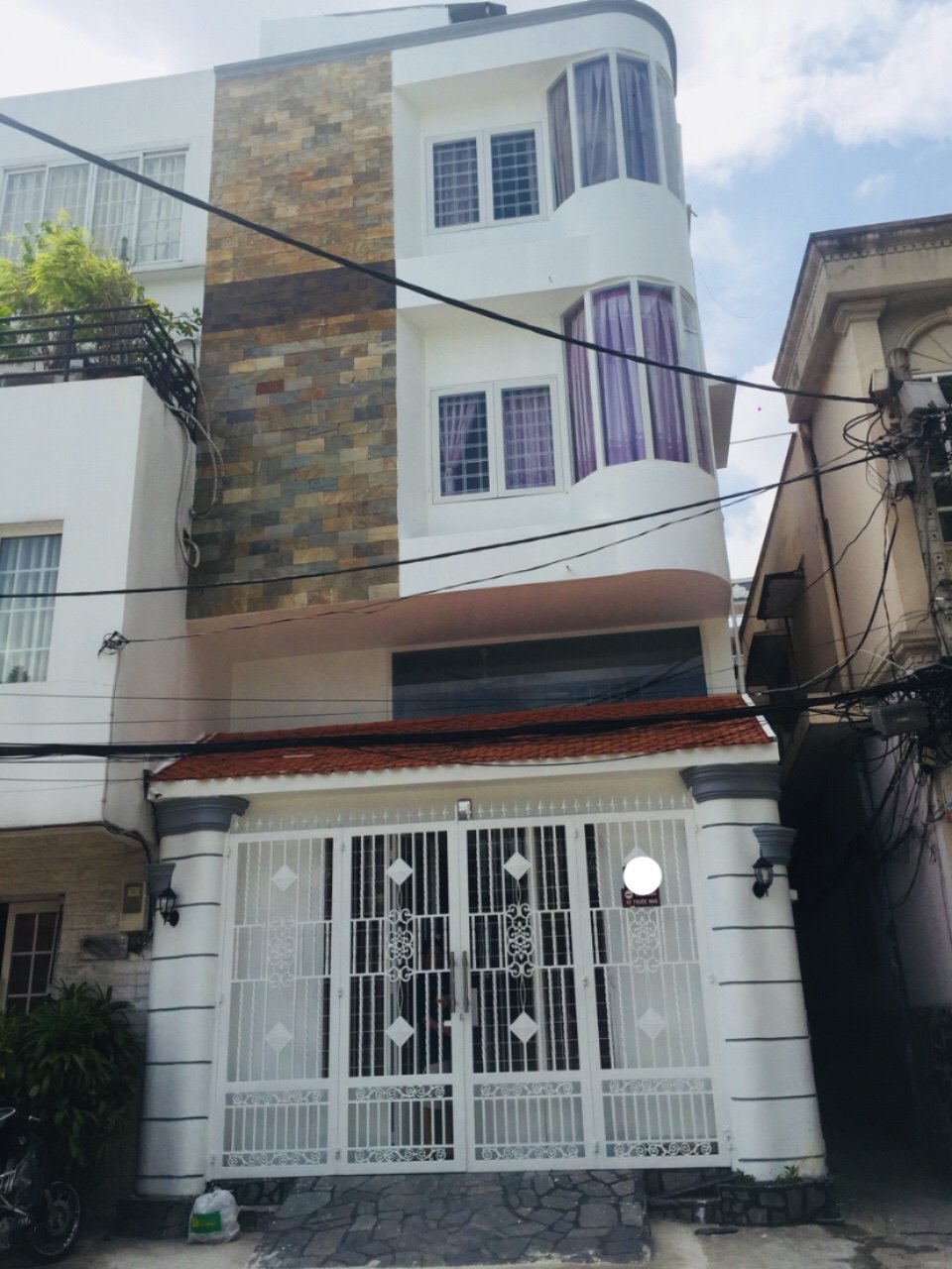 Cho thuê nhà MT đường Nơ Trang Long, P13, Bình Thạnh, giá thuê 70 tr/tháng
