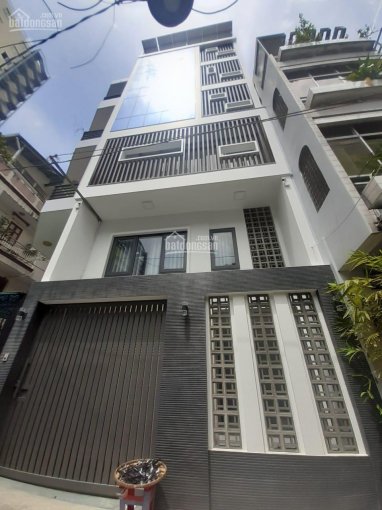 Bán gấp nhà góc 2 mặt tiền đường Nguyễn Duy Hiệu, DT 7x20m, 1 trệt 4 lầu, ST, giá 20 tỷ