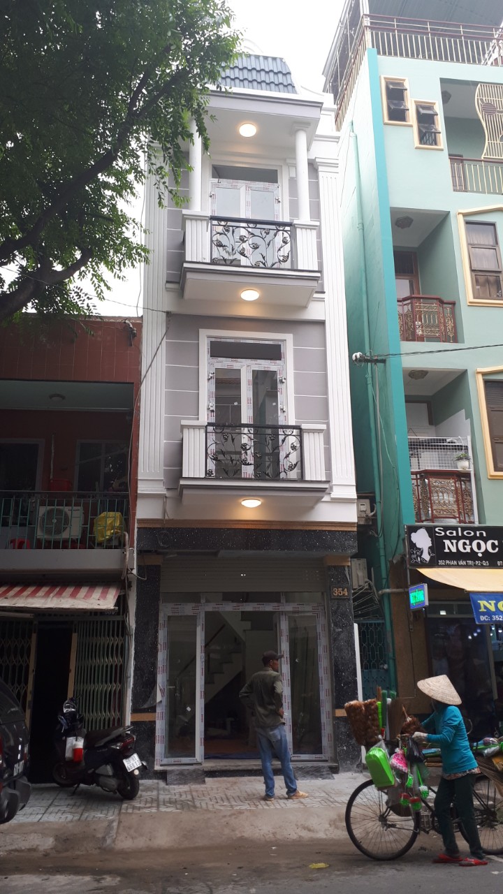Bán nhà HXH 101 đường Nguyễn Chí Thanh, phường 9, Quận 5, DT 8x20m, trệt, 2 lầu