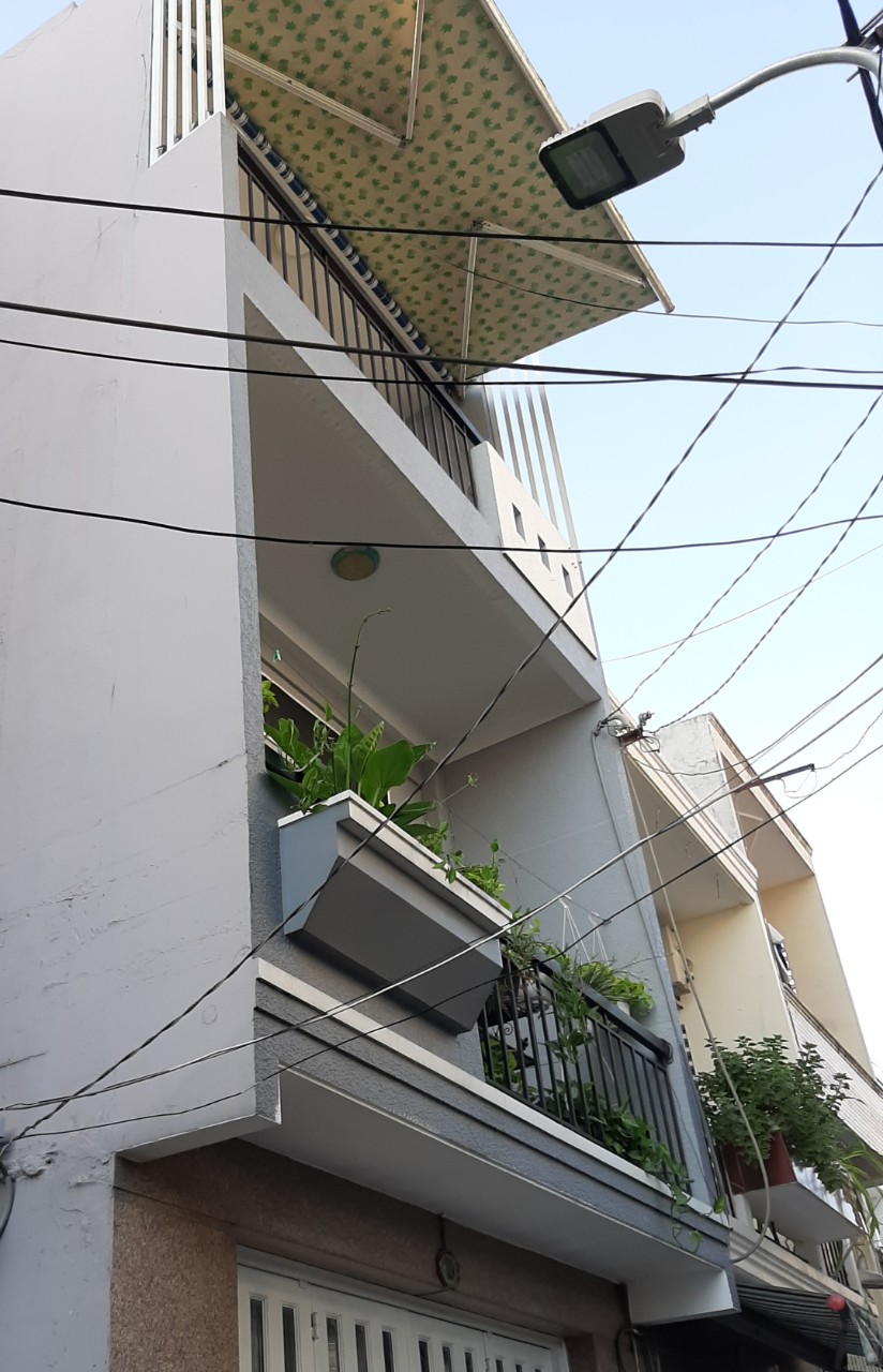 Cần bán nhà HXH Nơ Trang Long, quận Bình Thạnh, diện tích 70m2, 3 tầng, mặt tiền 6m.