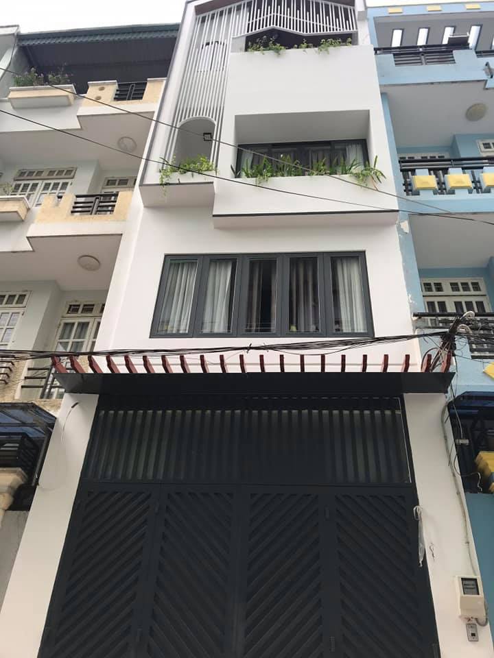 Bán nhà HXH 4 tầng Dương Quảng Hàm,P.5 giá 6ty5
