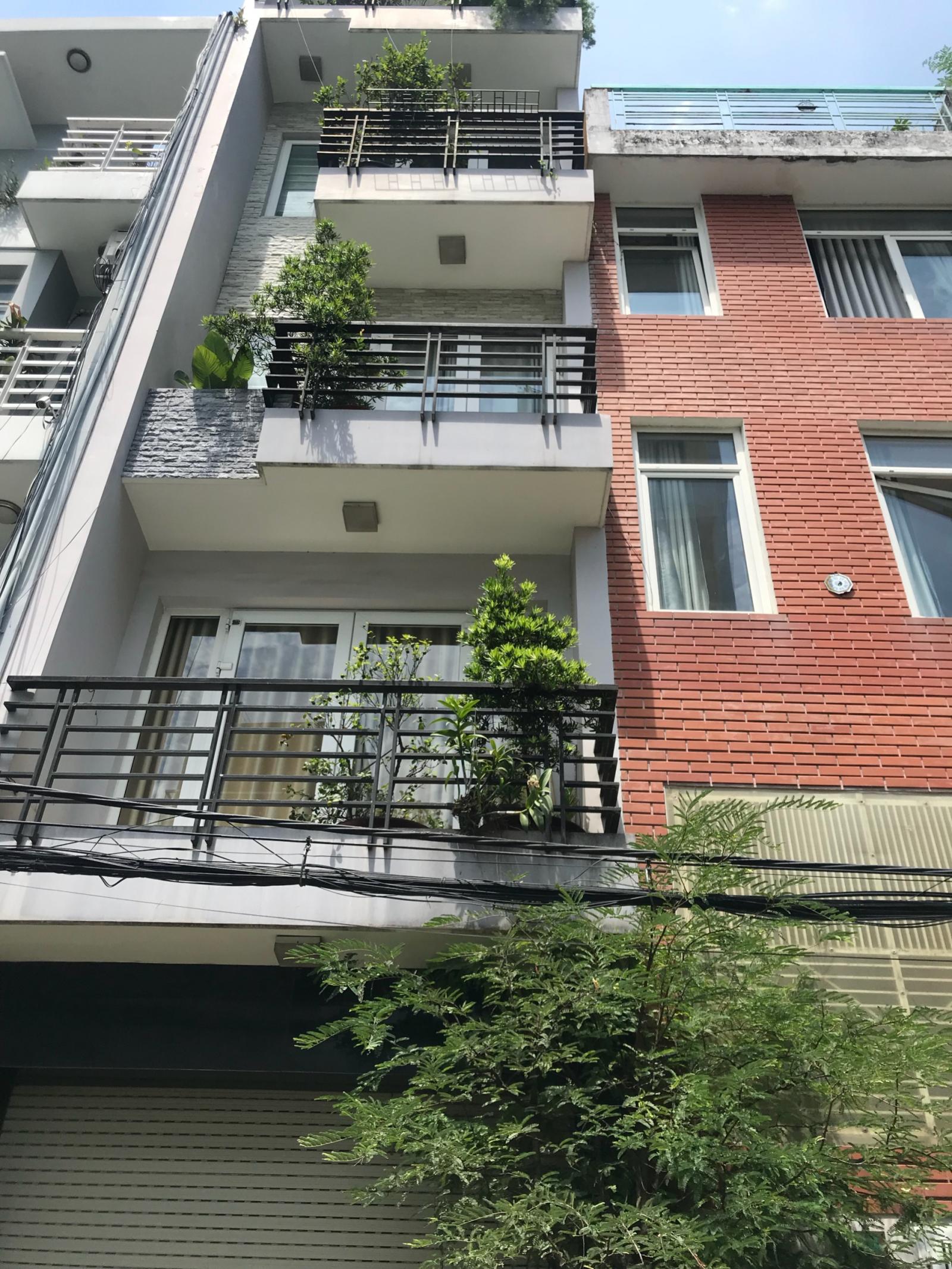 Bán nhà mặt tiền đường Trần Hưng Đạo 1 trệt 3 lầu giá 8,9 tỷ