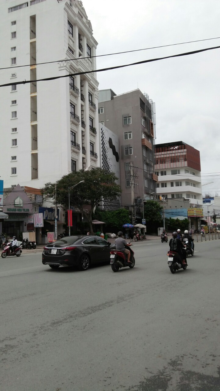 Bán tòa nhà 21 Nguyễn Thị Thập, Q7, P. Tân Phú, DT: (12,22m x 50,29m) hầm, 10 tầng, TN 15 tỷ/năm