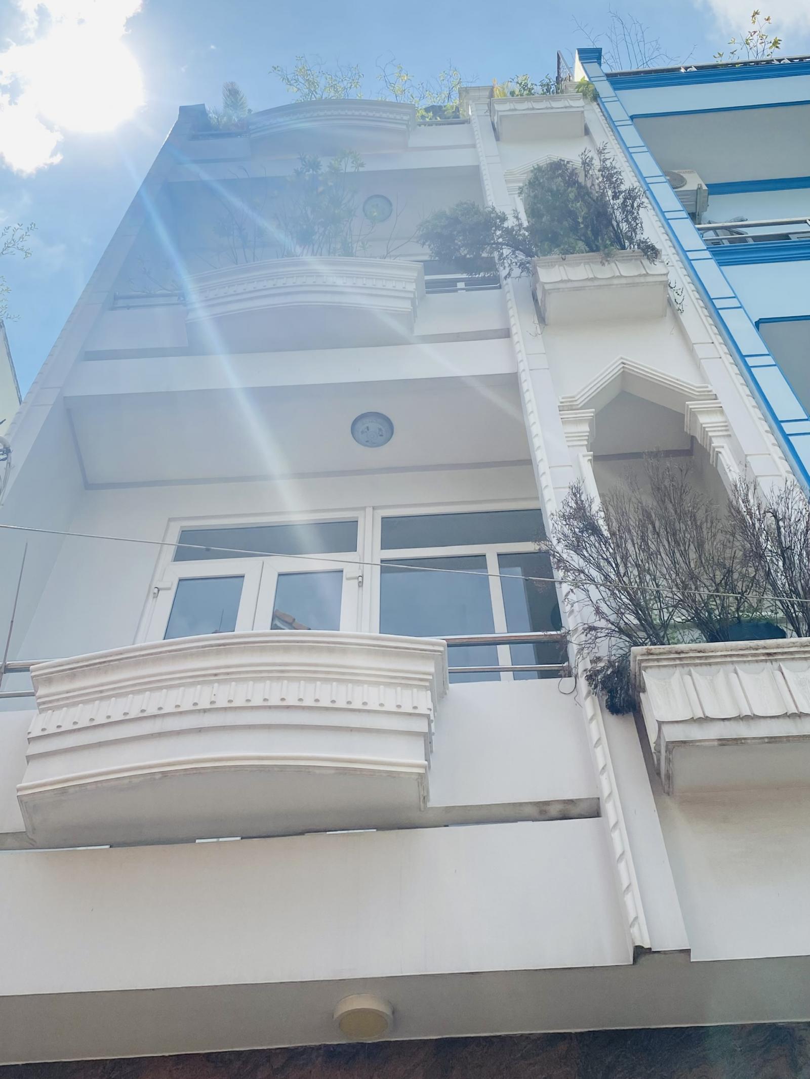 Bán nhà HXH 6m Nguyễn Thái Bình P12, TB(6,5 x 16m), 4 lầu chỉ 129tr/m2
