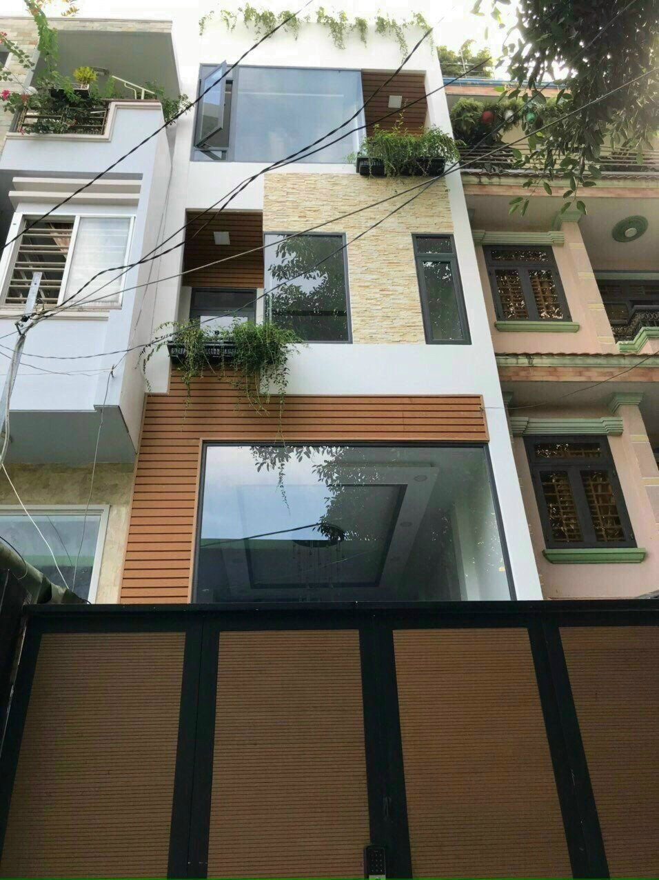 Bán Nhà HXH Quang Trung 4.2x16m Trệt Lửng 2Lầu ST Full Nội Thất cao cấp
