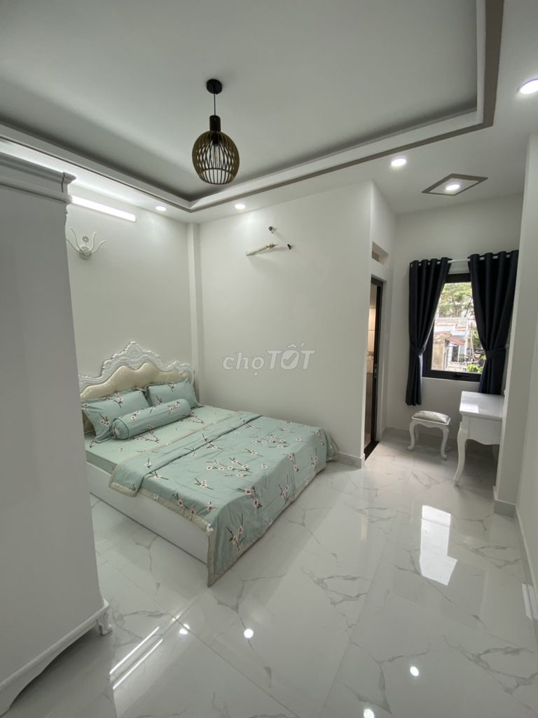 bán nhà quang trung p11 2lầu gần chợ công viên