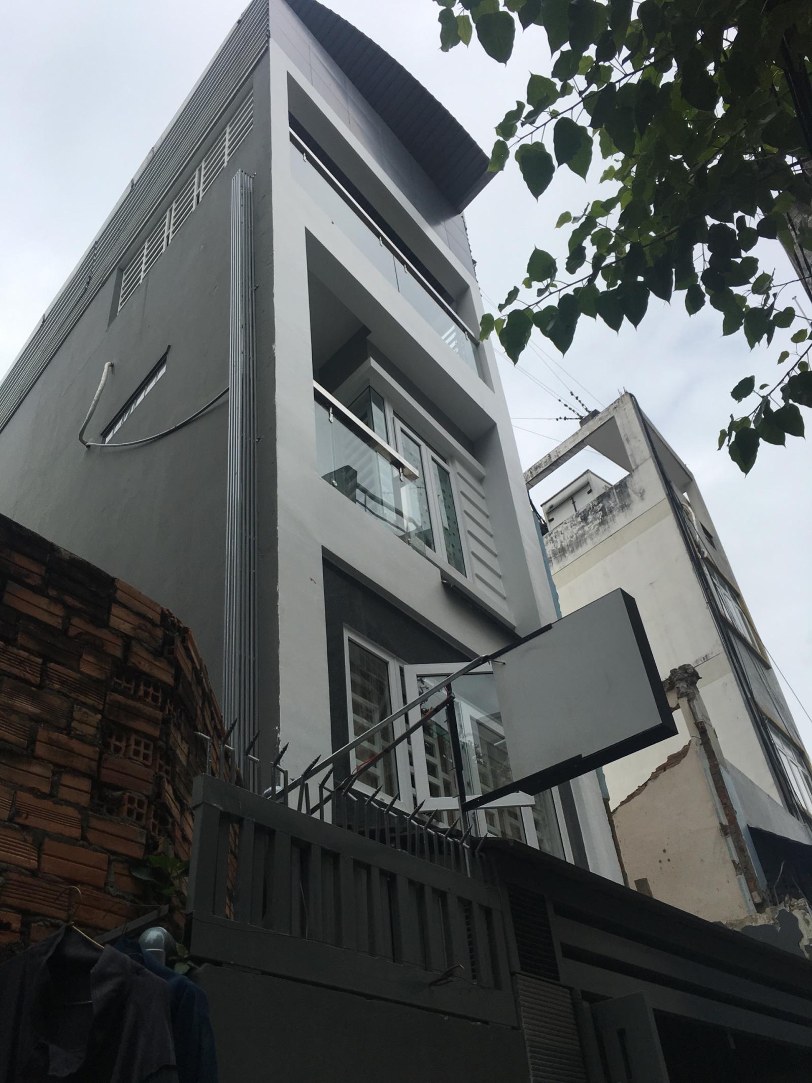 Cần bán nhà mặt tiền Trần Hưng Đạo, diện tích 4,1x16m, 5 tầng.