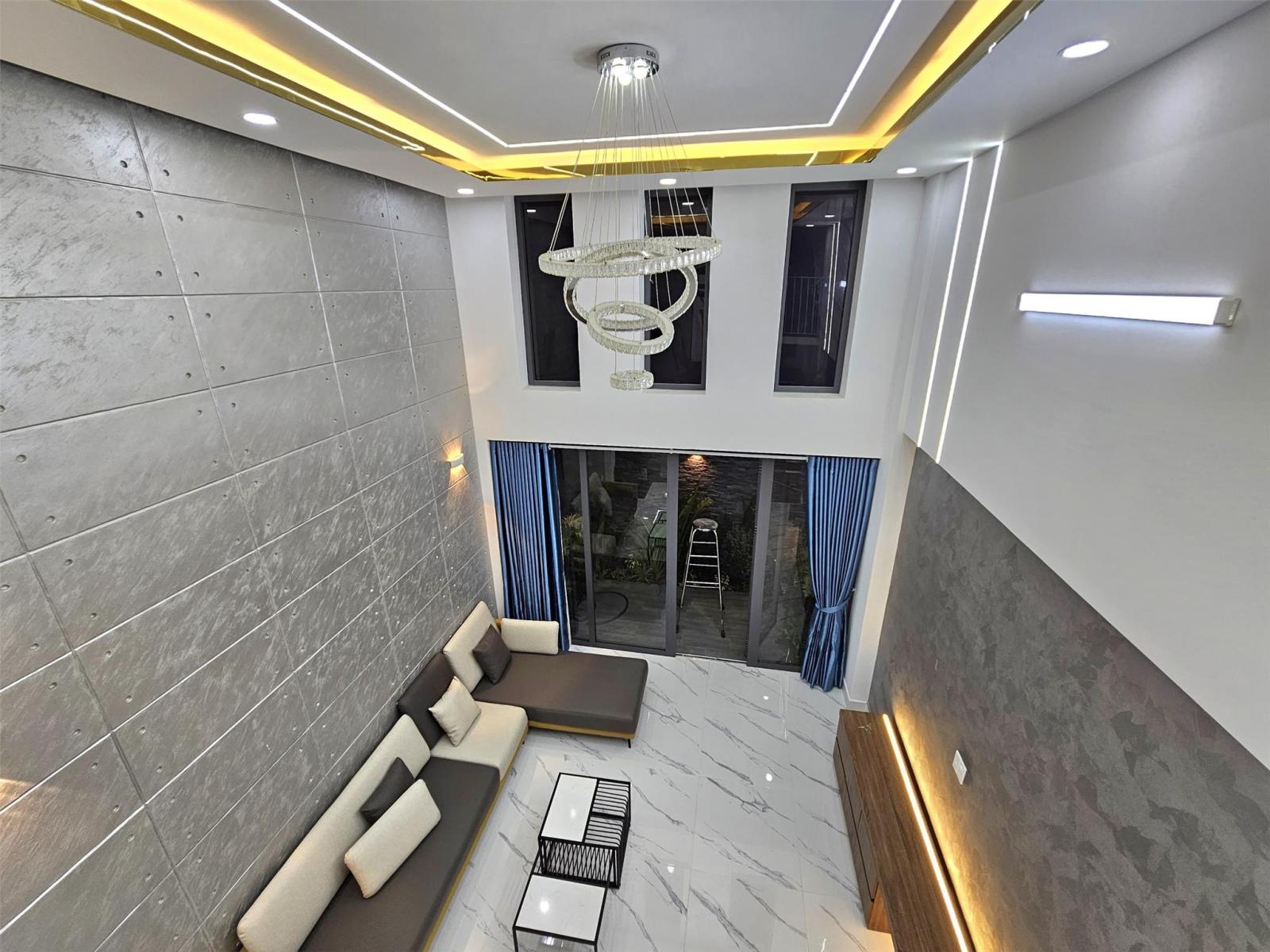 Bán nhà mới ở ngay An Phú Đông Quận 12 - 4 x13m 5 tầng Gara xe nhà như hình