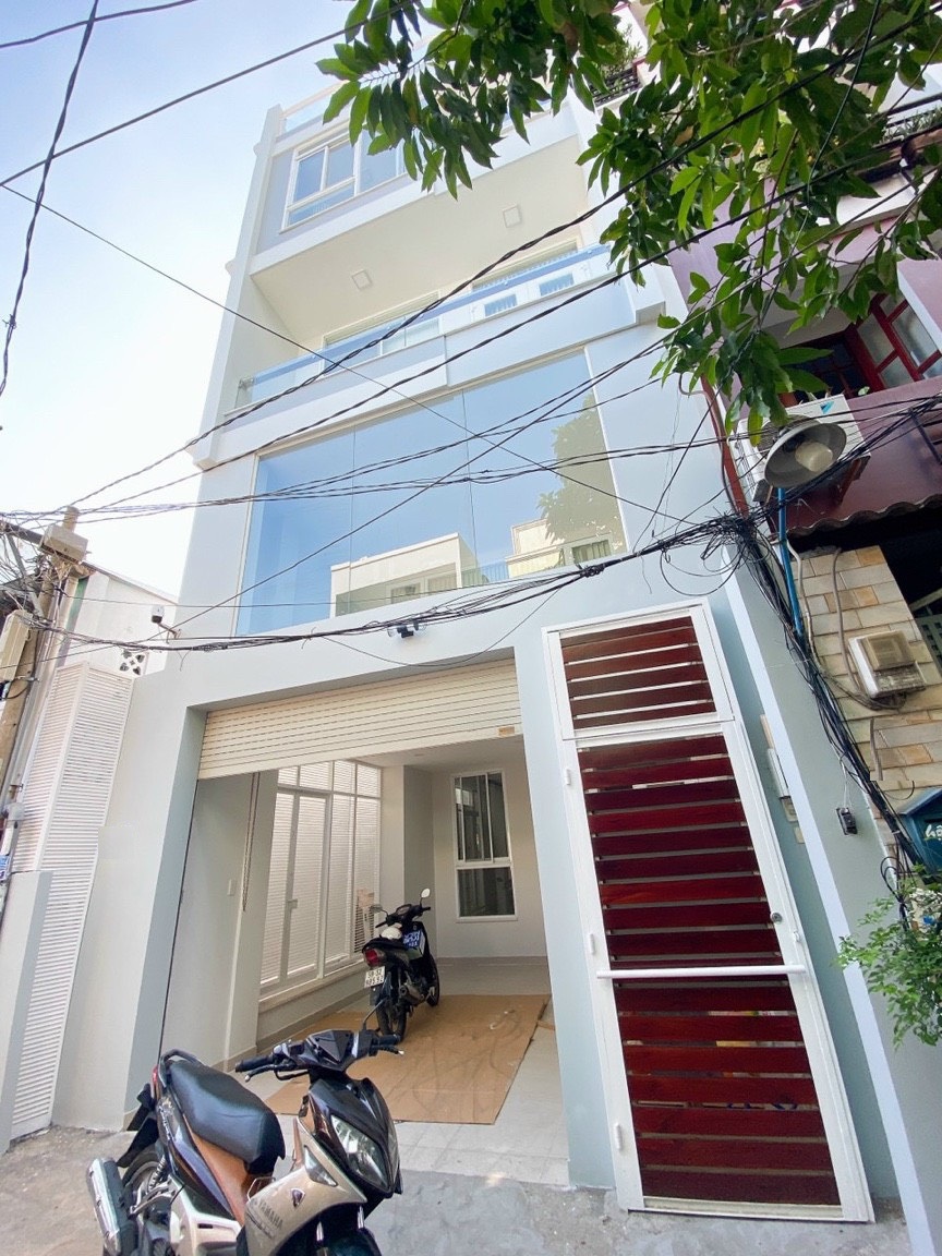 Nhà mới Nguyễn Văn Đậu (5,5x18m) - Xe hơi đậu trong nhà - cách Mặt Tiền 20m thiện chí bán!