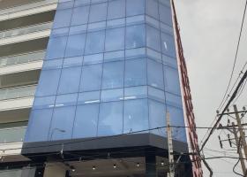 Bán tòa nhà mặt tiền góc Cô Giang Quận 1 hầm 6 lầu mới. DT 7x18m nở hậu giá 64.5 tỷ TL 7666212