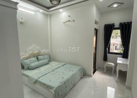 bán nhà quang trung p11 2lầu gần chợ công viên 8475912